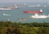 iran-conflict-disrupts-global-shipping-as-tankers-are-stranded,-damaged