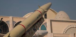 iran-strikes-kuwait-airport-fuel-tanks-and-bahrain-desalination-plant,-4-dead-in-the-gulf