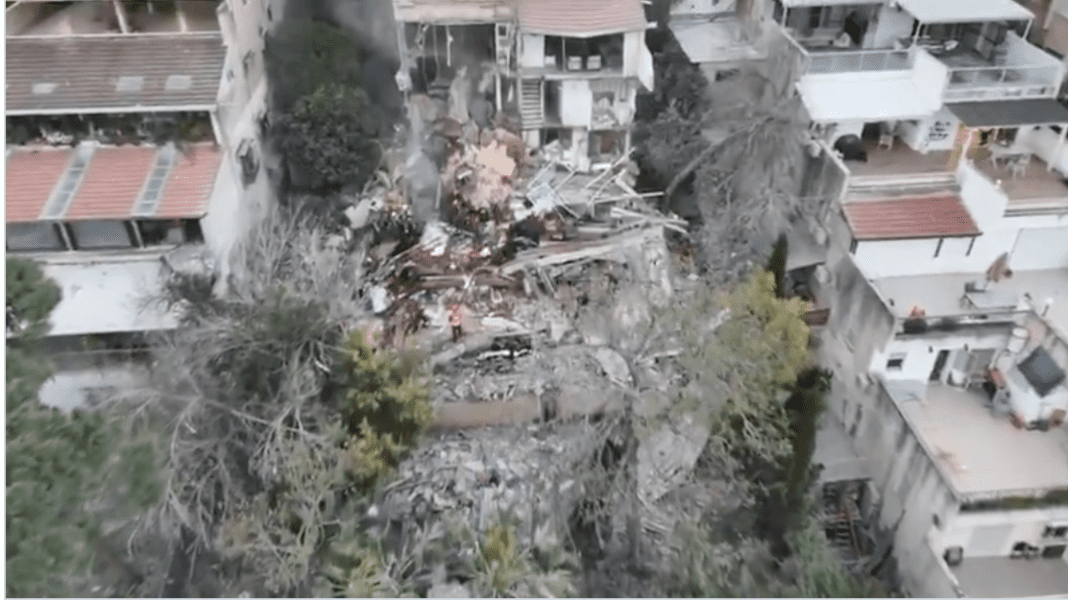 2-bodies-recovered from haifa-strike-site,-2-still missing; barrage-hits-central-israel,-multiple-injuries 2-bodies-recovered from haifa-strike-site,-2-still missing; barrage-hits-central-israel,-multiple-injuries