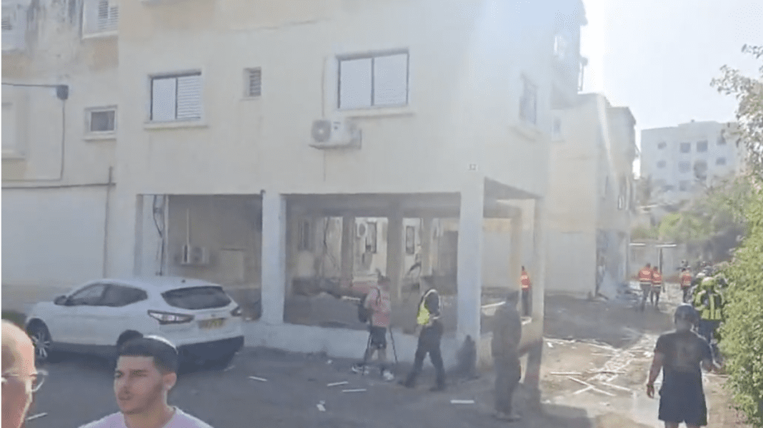 rocket-strike-damages-building-in-nahariya,-woman-in-her-60s-wounded rocket-strike-damages-building-in-nahariya,-woman-in-her-60s-wounded