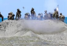 sending-combat-troops-to-exercise, japan-leaves-wwii-ghosts-behind