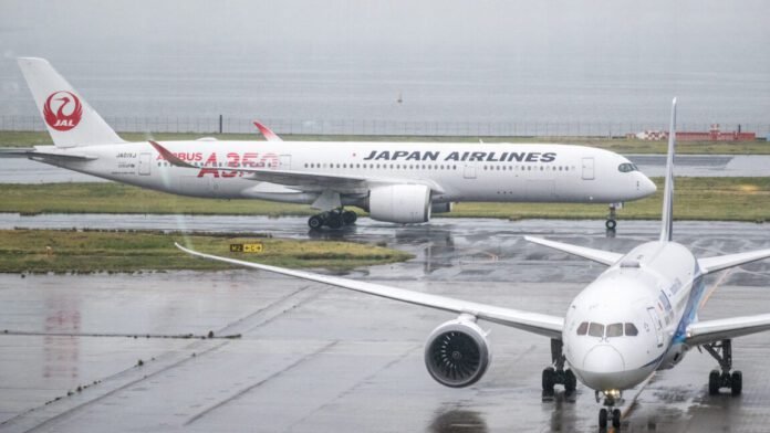 humanoid-robots-start-sorting-luggage-in-tokyo-airport-test-amid-labor-shortage