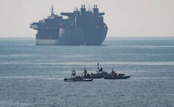 singapore-flagged-ship-hit-in-strait-of-hormuz-as-iran-tests-us-deal 