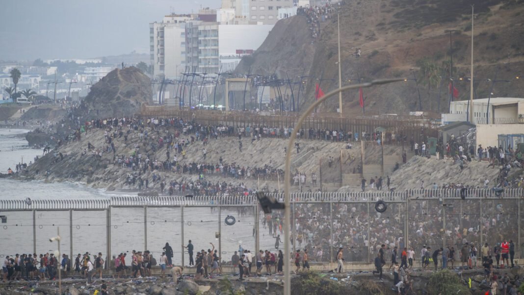 morocco-border-breach-leaves-18-dead-as-49,000-enter-spanish-enclave morocco-border-breach-leaves-18-dead-as-49,000-enter-spanish-enclave