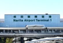 thousands-stranded-at-japan’s-narita-airport-after-record-rain-kills-four