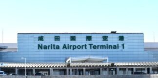 thousands-stranded-at-japan’s-narita-airport-after-record-rain-kills-four