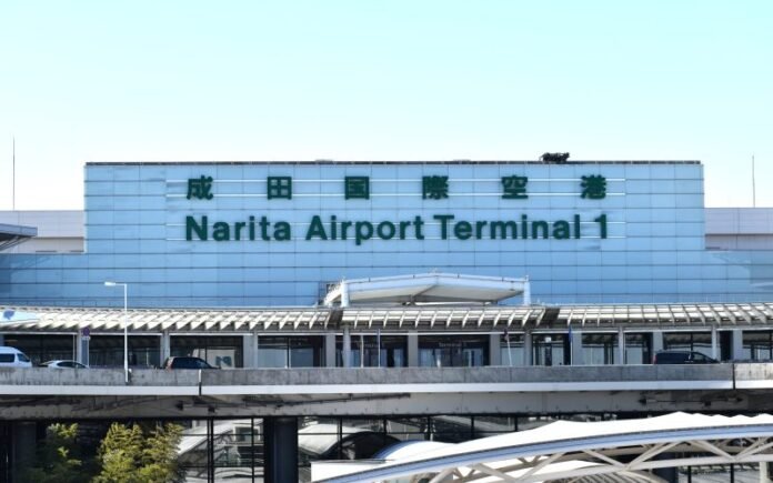 thousands-stranded-at-japan’s-narita-airport-after-record-rain-kills-four