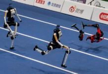 World humanoid robot games show runners breaking records, bursting into flames world-humanoid-robot-games-show-runners-breaking-records,-bursting-into-flames