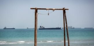 iran-says-it-agreed-with-oman-on-hormuz-passage-route,-links-reopening-to-us-commitments