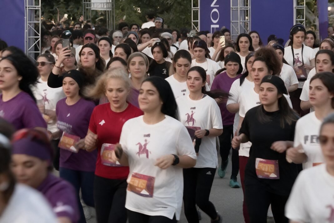 women-run-without-hijabs-in-tehran-as-300,000-attend-state-organized-rally 